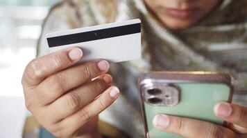 Using a mobile phone for online shopping with a credit card video