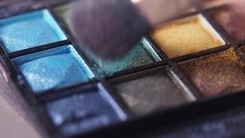 Bright colors and textures in a makeup palette display video