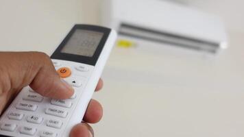 Controlling air conditioning settings with a remote device at home video