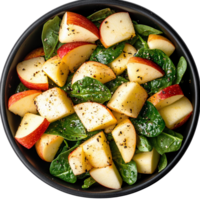 Apple and spinach salad with black pepper, overhead view png