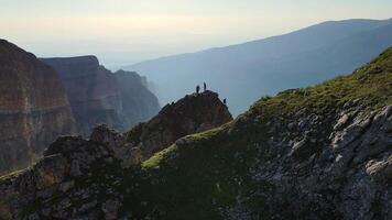 Drone captures climbers setting up a springboard for rope jumping video
