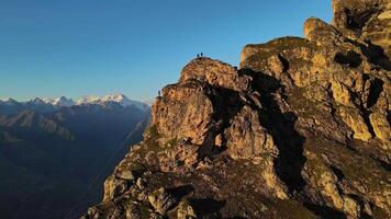 Aerial view of people working with ropes on the summit video