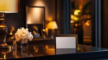 luxury hotel business card on stylish table with flowers and soft lighting photo