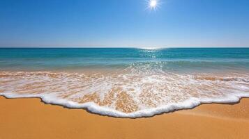 bright beach scene with golden sand and turquoise water under clear sky photo
