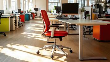 bright office with natural sunlight, featuring red ergonomic chair photo