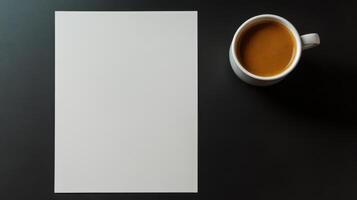 Blank paper and cup of coffee on black background photo