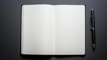 An open notebook and pen on a black background photo