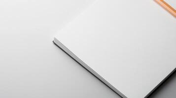 An open notebook with a pencil on top photo