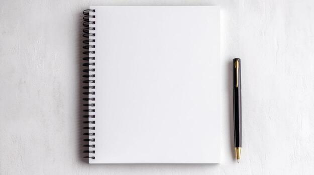 Blank notebook with pen on white table top view photo
