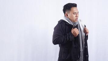 Asian Man with Fever Symptoms on White Background photo