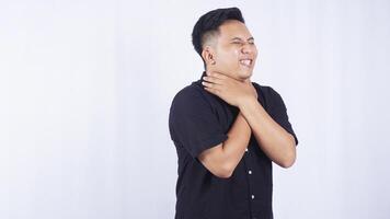 Side View of Young Asian Man with Inflammation in The Throat on White Background photo