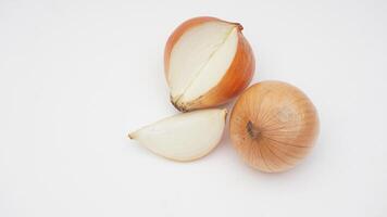 Fresh Bulb and Slice of Onion on White Background photo