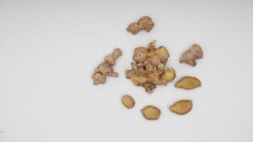 Top View of Set of Ginger Spice on White Background photo