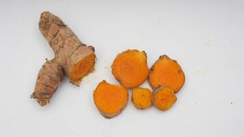 Slice of Ginger Spice on White Background photo