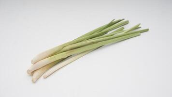 Stalks of Fresh Lemongrass on White Background photo