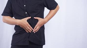 Close Up of Man Having Stomachache on White Background photo