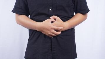 Close Up of Man with Stomachache on White Background photo