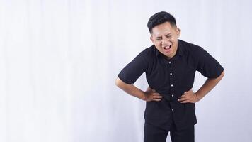 Asian Man with Abdominal Pain on White Background photo