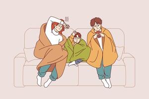 Caught cold family sits on sofa wrapped in blanket and drinks hot tea trying to get rid of virus vector