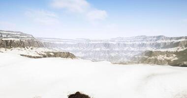 Breathtaking view of a vast snowy landscape with mountains in the distance video