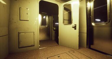 Light illuminates an empty train compartment with metallic finishes video