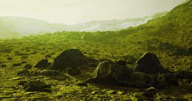 Mysterious landscape of rocky terrain under dim light on alien surface video