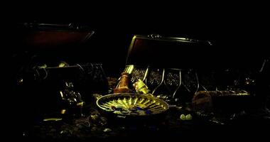 Mysterious treasure trove filled with gold and ancient artifacts at night video