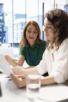 Team of HR employers preparing interview questions to vet selected applicants and ensure their skills are strong enough match for the role. Teamworking recruiters assessing candidate work experience photo