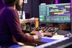 Professional artist using an usb stick to edit audio recordings in home studio, working in music industry post production. Skilled singer mixing and mastering tunes, daw software on pc. photo