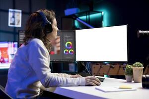 editor using editing software on isolated screen monitor to upgrade footage shot, commissioned by production teams outsourcing tasks. Freelancer videographer finishing project on mockup PC photo
