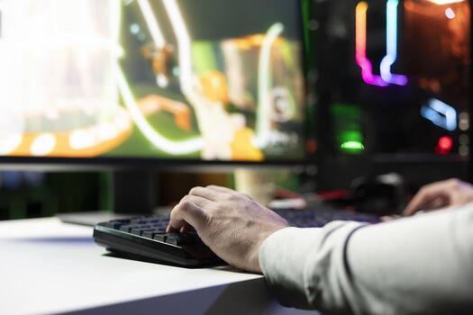 Professional gamer engaging in online competitive multiplayer match using cutting edge gaming setup. Close up on man at home captivating spectators during live broadcast, playing videogames photo