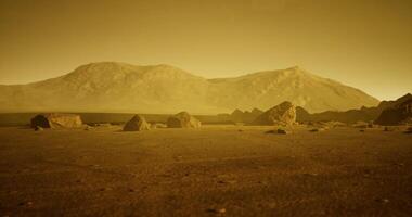 Exploring the rocky terrain of an alien landscape under a hazy sky video