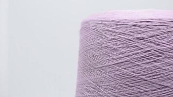 Spool of Pink Thread on White video