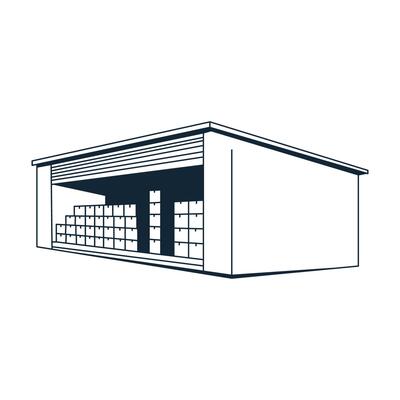 A warehouse with a roll up door and numerous stacked boxes inside