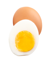 Single raw chicken egg and peeled cooked or boiled egg with egg yolk in half in stack isolated with clipping path in file format png