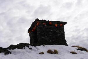 A small stone building photo
