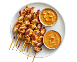 Chicken satay skewers with dipping sauce png