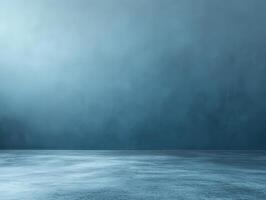 A serene blue gradient background with a smooth, reflective surface. photo