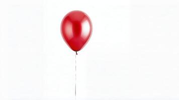 Single red balloon on white background. photo