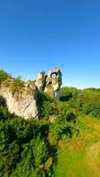 Cinematic FPV flight through a hole in the limestone rock in Poland video