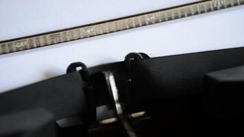 Typing the expression I Miss You with an old manual typewriter video