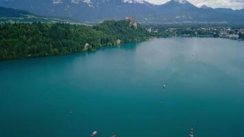 Lake Bled is famous as one of the most romantic places in Europe, perfect for a honeymoon or wedding. This image can be used in the context of romantic getaways, wedding tourism and luxury holidays. video