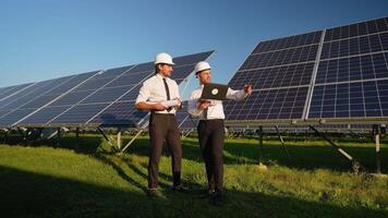 Two Engineers Analyze Solar Energy Project Onsite video