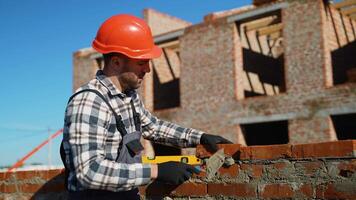 Builder Constructing a Brick Cottage with Precision video