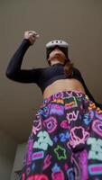 Enjoy an exciting Virtual Reality Experience while wearing colorful activewear for fun and fitness video