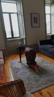 Home Exercise Routine in a Bright and Inviting Living Space Designed for Wellness Activities video
