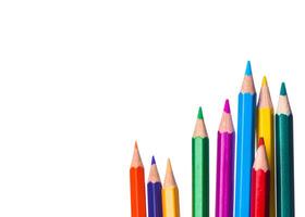 Colorful collection of sharpened pencils arranged in a vibrant display against a white background photo