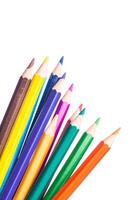 Bright assortment of colored pencils arranged in a vibrant and artistic display on a white background photo