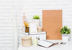 Workspace setup featuring stationery, decor, and organization elements for a productive environment photo