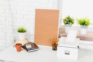 Workspace setup featuring natural elements and organization tools with a clean design ideal for productivity photo